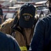 Sailors and Federal San Diego Firefighters fight fire aboard USS Bonhomme Richard