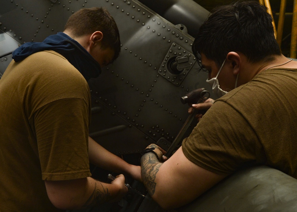 U.S. Navy Sailors Prepare Helicopter for Flight Operations