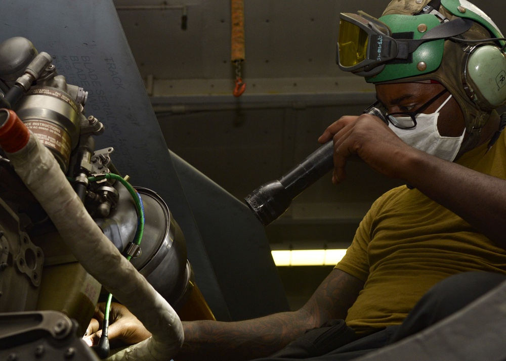 U.S. Navy Sailors Prepare Helicopter for Flight Operations