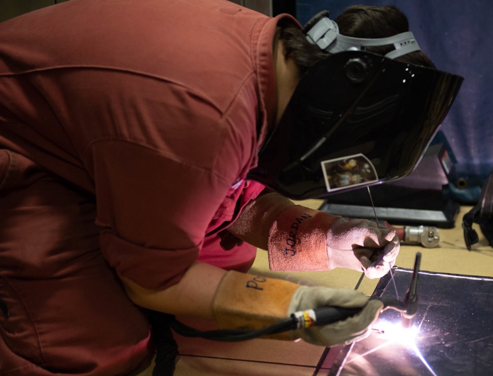 A Sailor Conducts Welding Repairs