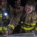 Sailors and Federal San Diego Firefighters fight fire aboard USS Bonhomme Richard