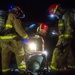 Sailors and Federal San Diego Firefighters fight fire aboard USS Bonhomme Richard