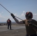 Sailors Aboard USS Bataan (LHD 5) Move the Brow