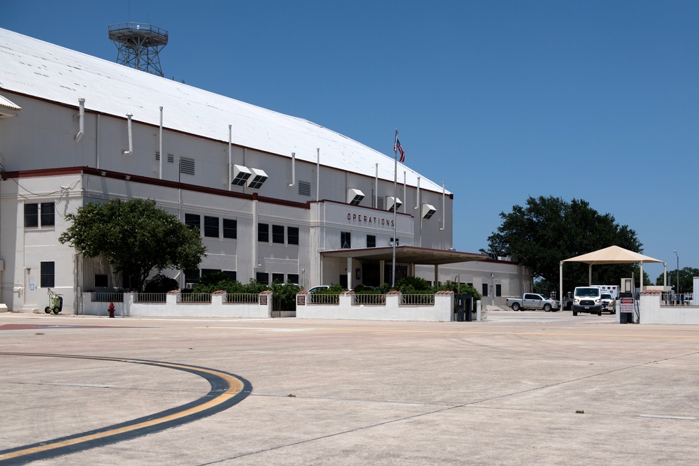 Audie Murphy receives help with patient transport