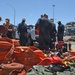 Bonhomme Richard Sailors remove firefighting equipment