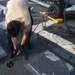 Sailors Prepare a MH-60R For Takeoff
