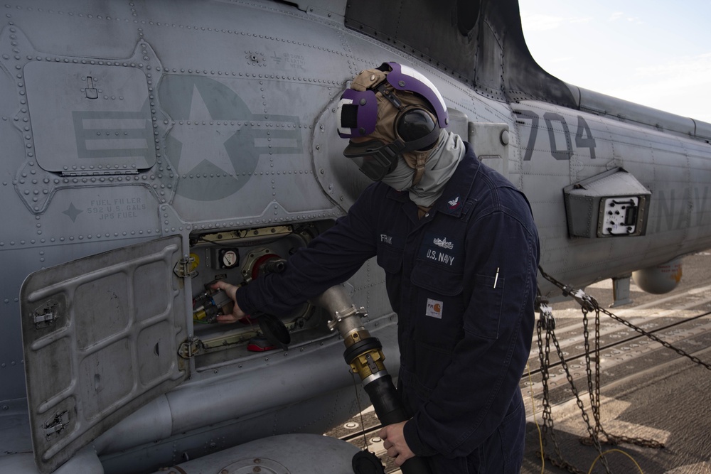 Sailors Prepare a MH-60R For Takeoff