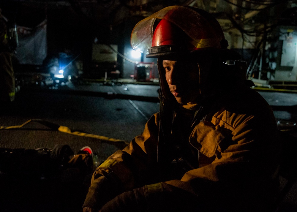 Sailor stands by to fight Bonhomme Richard fire