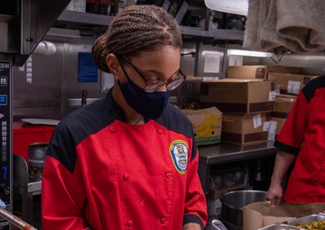 Sailor Prepares Food