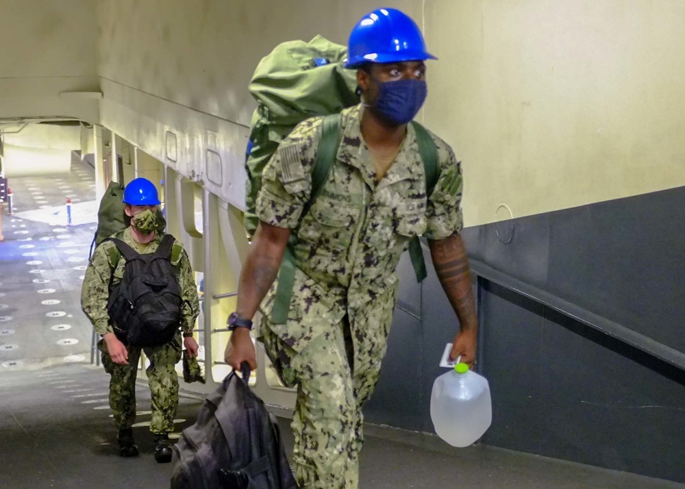 USS Tripoli Move aboard