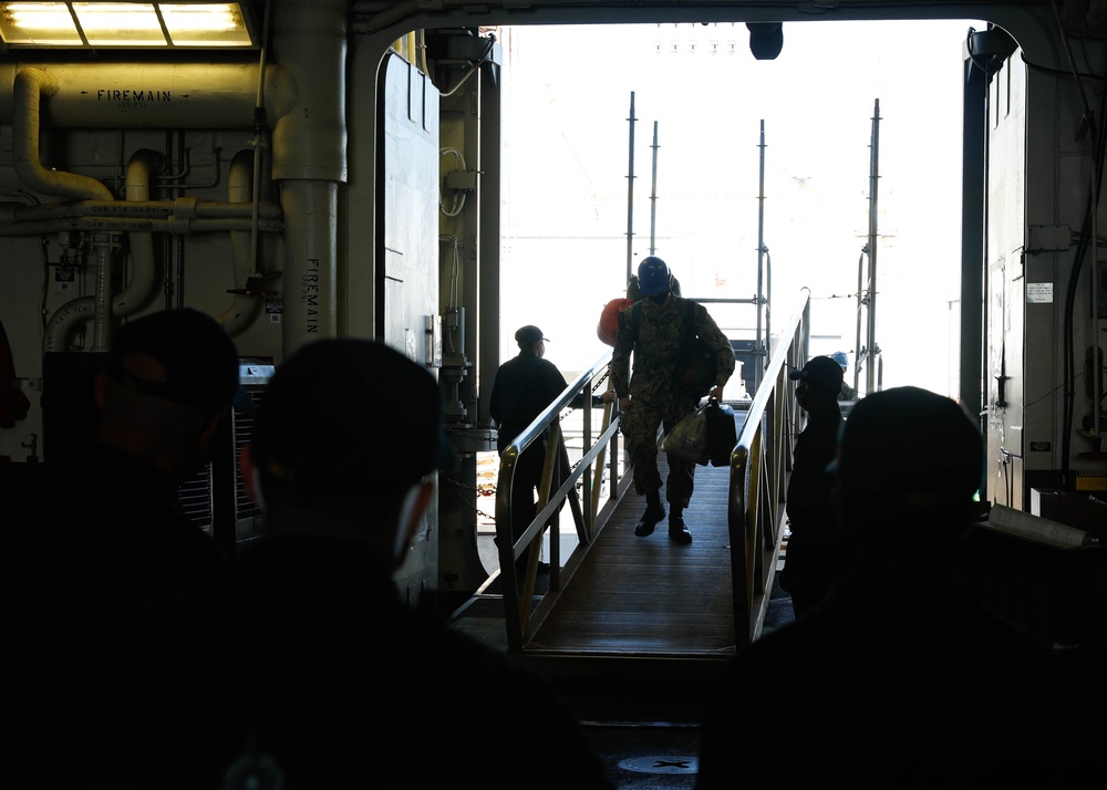 USS Tripoli crew Move aboard