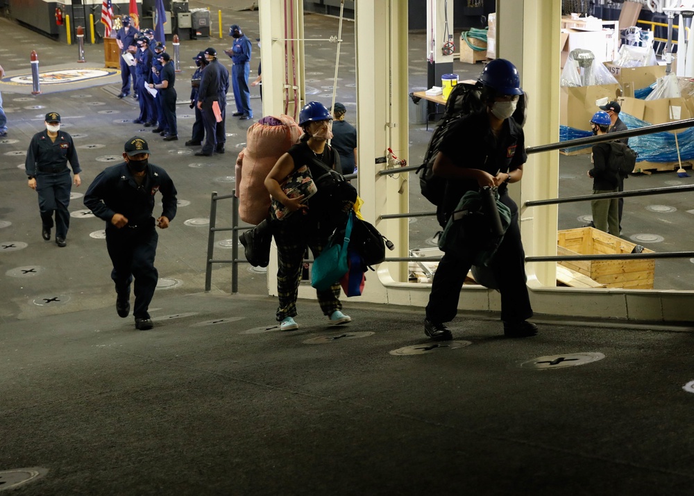 USS Tripoli crew move-aboard