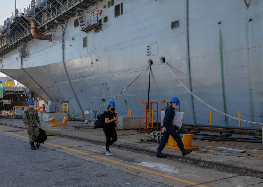 Tripoli crew move aboard