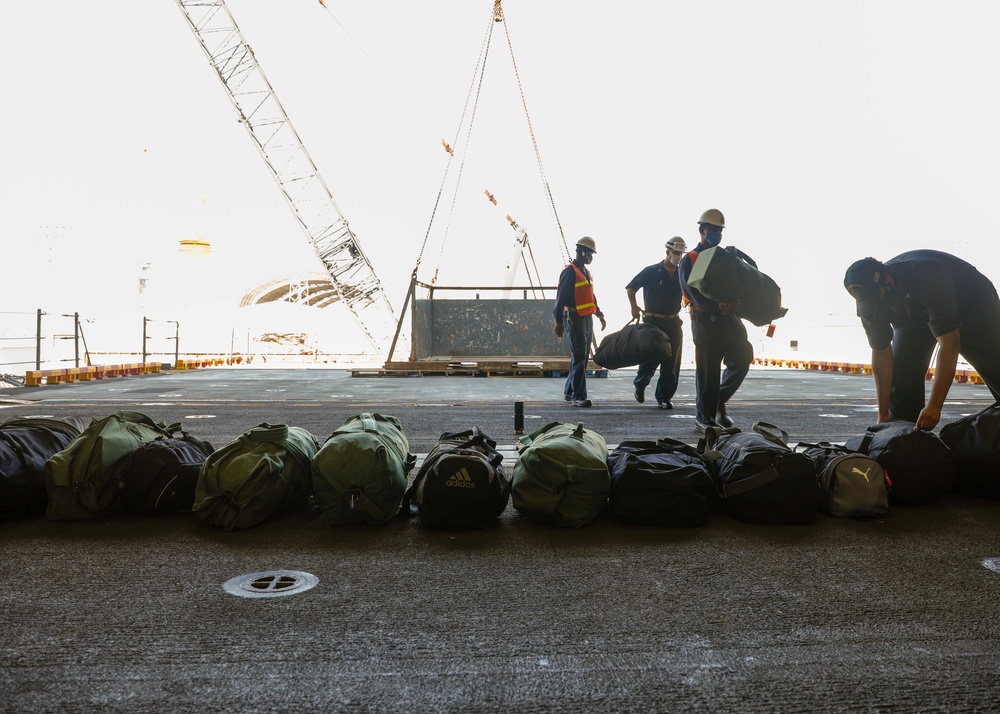 Tripoli Crew Move Aboard