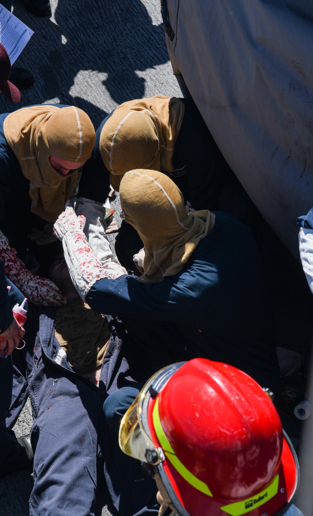 USS Pioneer sailors respond to a medical emergency drill