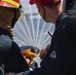 USS Pioneer sailors fight a simulated class alpha fire