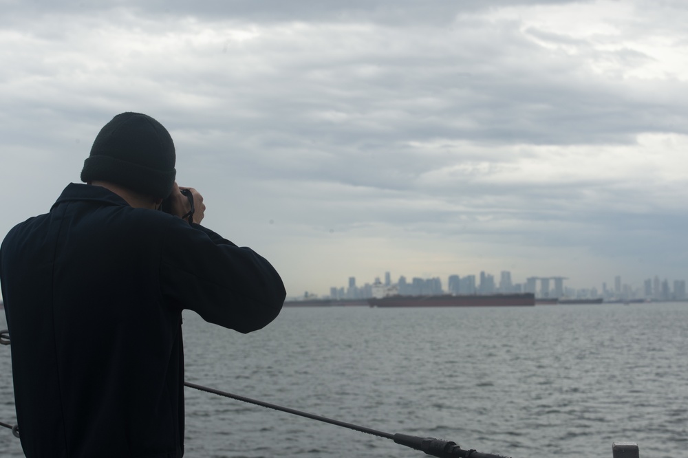 USS Ralph Johnson Sails Through the Strait of Malacca