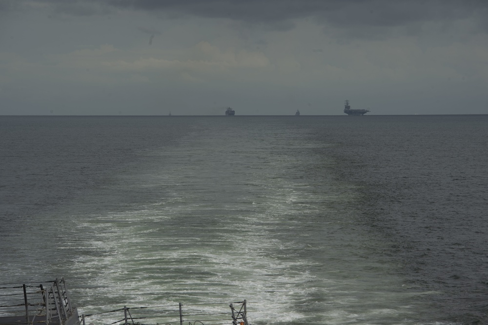 USS Ralph Johnson Sails Through the Strait of Malacca