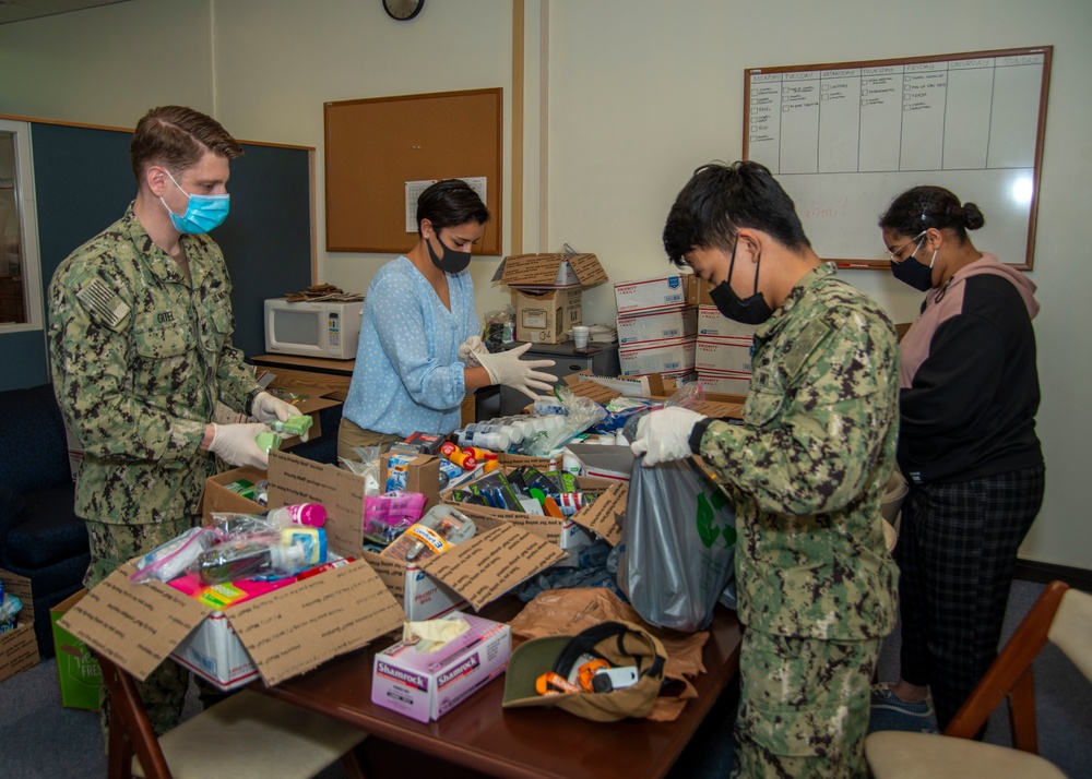 JSA/CSADD Volunteers Prepare Care Packages for ROM Sailors