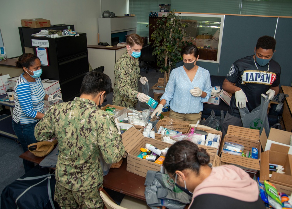 JSA/CSADD Volunteers Prepare Care Packages for ROM Sailors