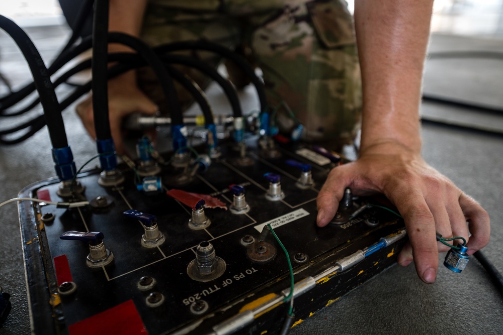 379th EAMXS members perform maintenance on KC-135 Stratotanker