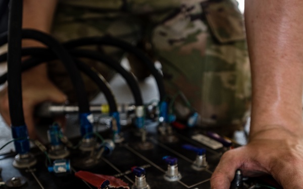 379th EAMXS members perform maintenance on KC-135 Stratotanker