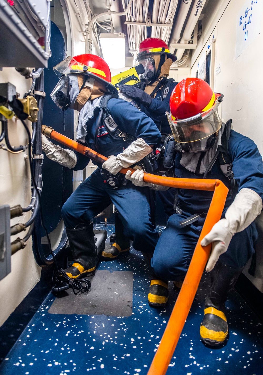 Sailors Aboard USS Germantown (LSD 42) Fight a Simulated Fire During Damage Control Training
