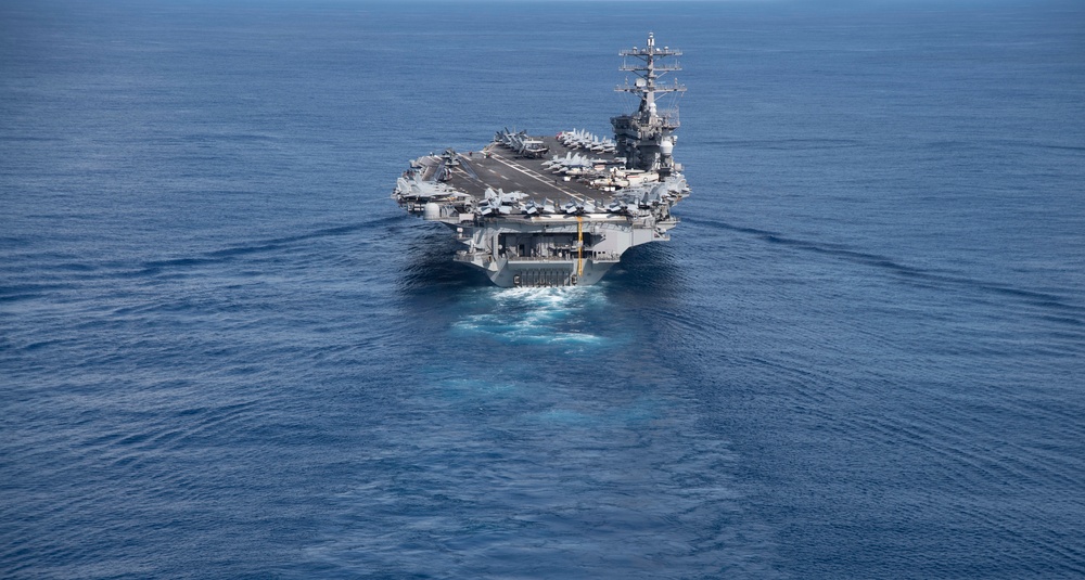 Nimitz Carrier Strike Group joins Indian Navy for cooperative deployment.