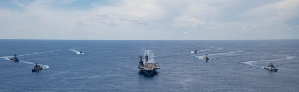 Nimitz Carrier Strike Group joins Indian Navy for cooperative deployment.