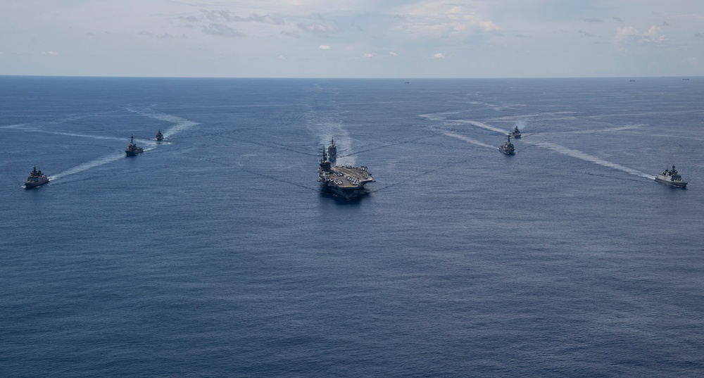Nimitz Carrier Strike Group joins Indian Navy for cooperative deployment.