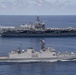 Nimitz Carrier Strike Group joins Indian Navy for cooperative deployment.