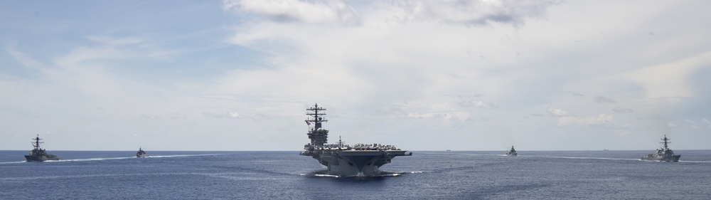 Nimitz Carrier Strike Group joins Indian Navy for cooperative deployment.