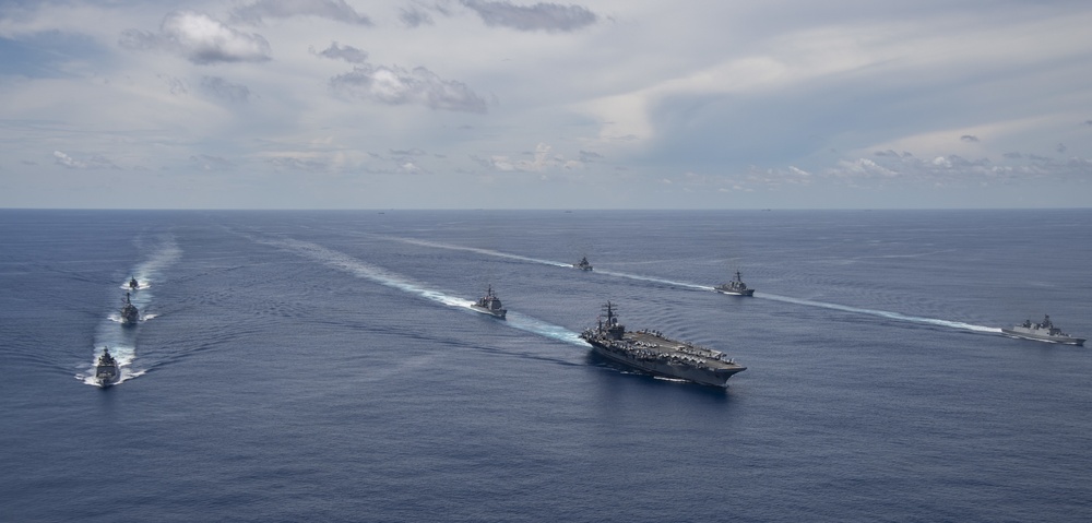 Nimitz Carrier Strike Group joins Indian Navy for cooperative deployment.