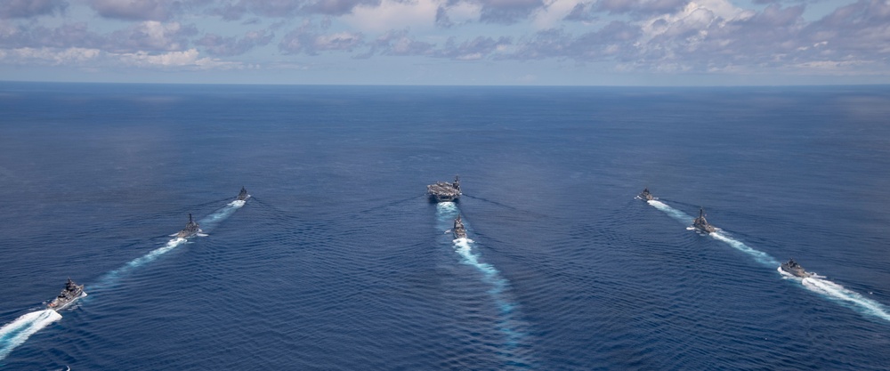 Nimitz Carrier Strike Group joins Indian Navy for cooperative deployment.