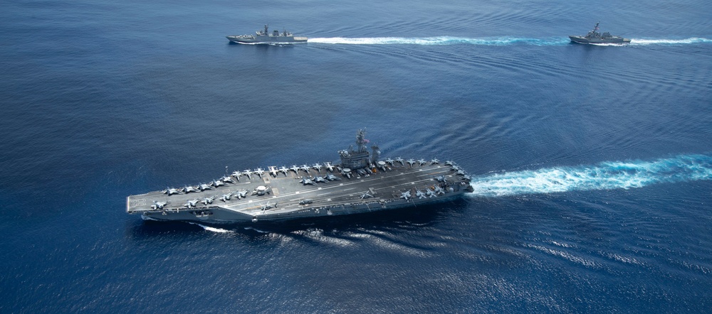 Nimitz Carrier Strike Group joins Indian Navy for cooperative deployment.