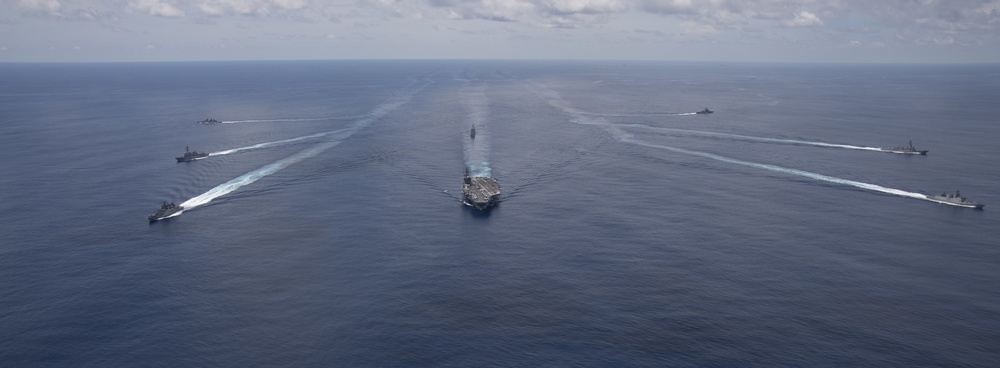 Nimitz Carrier Strike Group joins Indian Navy for cooperative deployment.