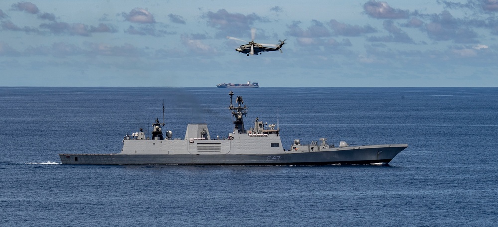 Nimitz Carrier Strike Group joins Indian Navy for cooperative deployment.