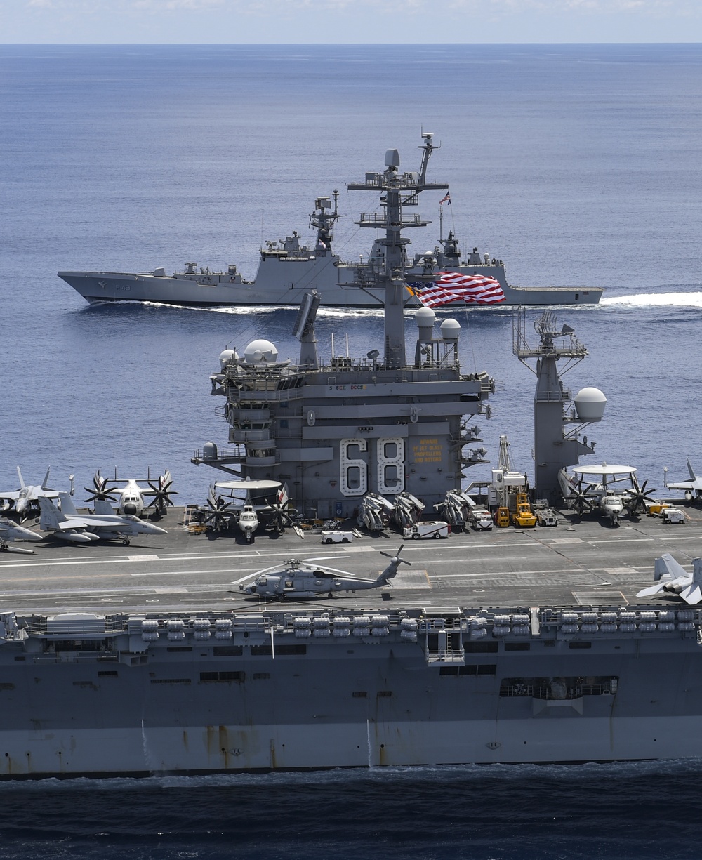 Nimitz Carrier Strike Group joins Indian Navy for cooperative deployment.