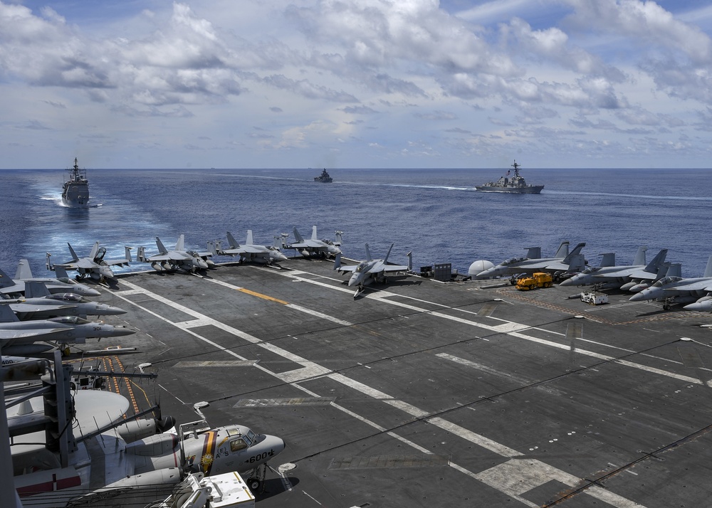 Nimitz Carrier Strike Group joins Indian Navy for cooperative deployment.