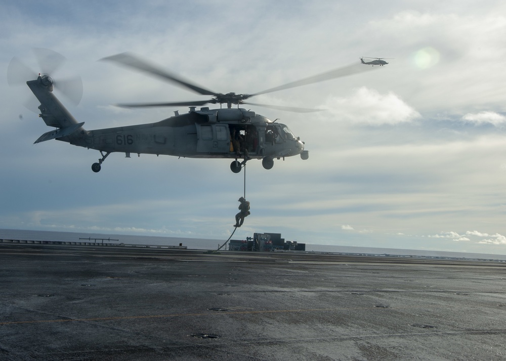 U.S. Navy Sailors Conduct Drill Aboard Aircraft Carrier