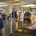 USS Constitution Commanding Officer Cmdr. John Benda gives a tour of the ship to the Secretary of the U.S. Department of the Interior David Bernhardt