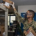 Post Office Staff Distributes Packages