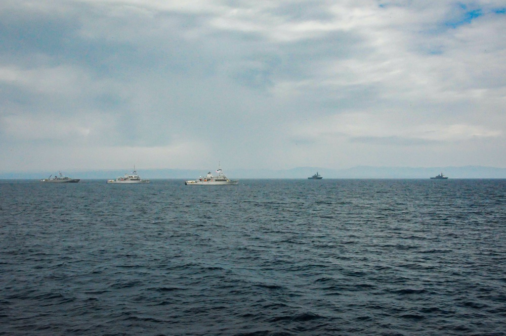US NAVY and JMSDF mine countermeasures ships sail together for a PHOTOEX