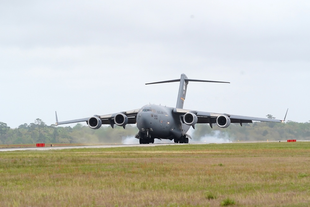 Op Blue Hero: 97th AMW transports BMT grads to Keesler for technical training