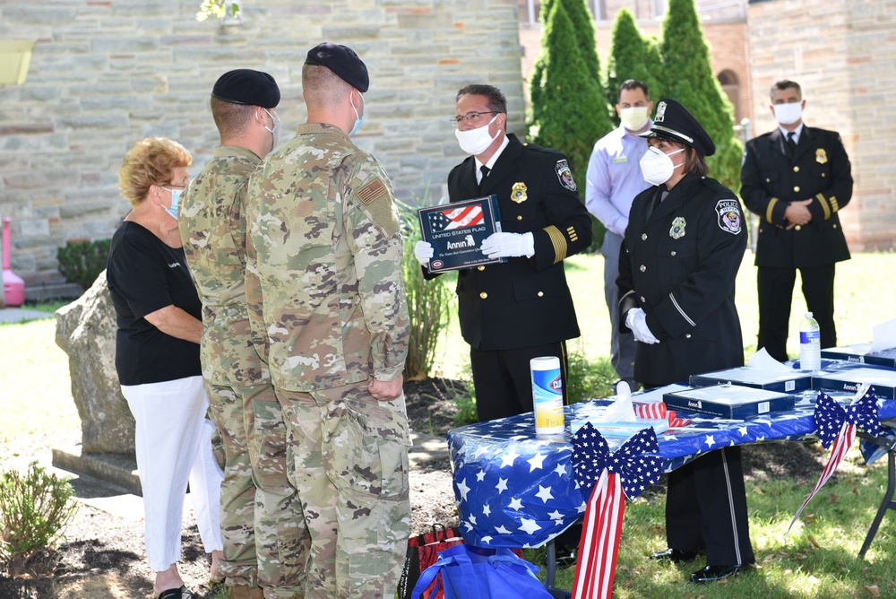 Niagara Airmen present flags in appreciation of community support