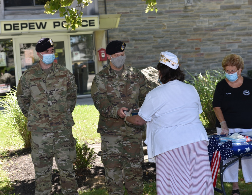 Niagara Airmen present flags in appreciation of community support