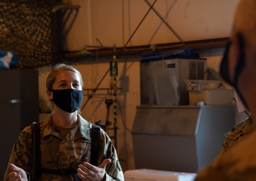 Emergency management NCO in charge briefs wing leadership