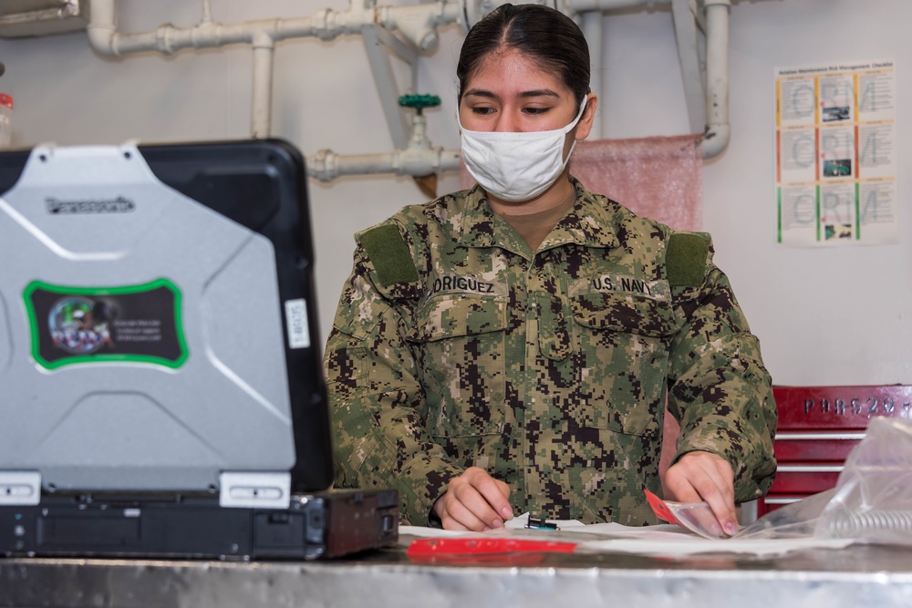 AIMD Sailor performs maintenance