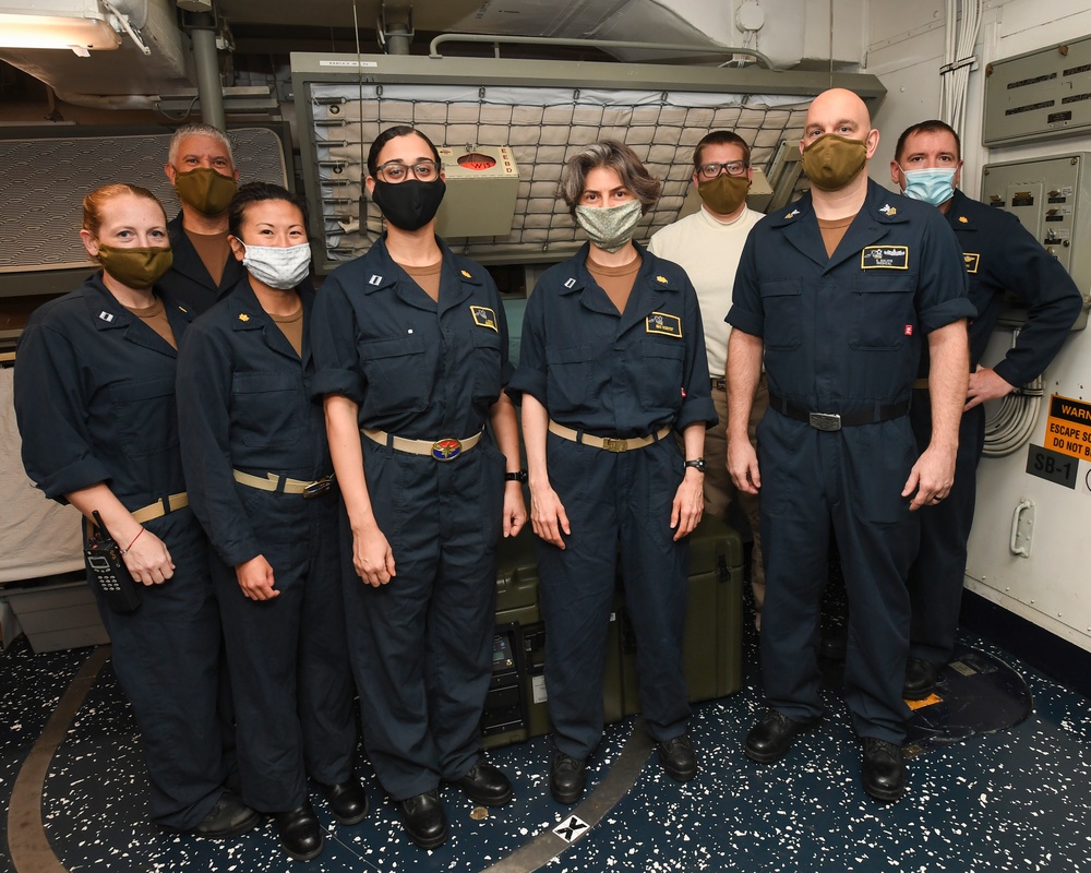 USS Nimitz COVID Response Team Poses For A Photo
