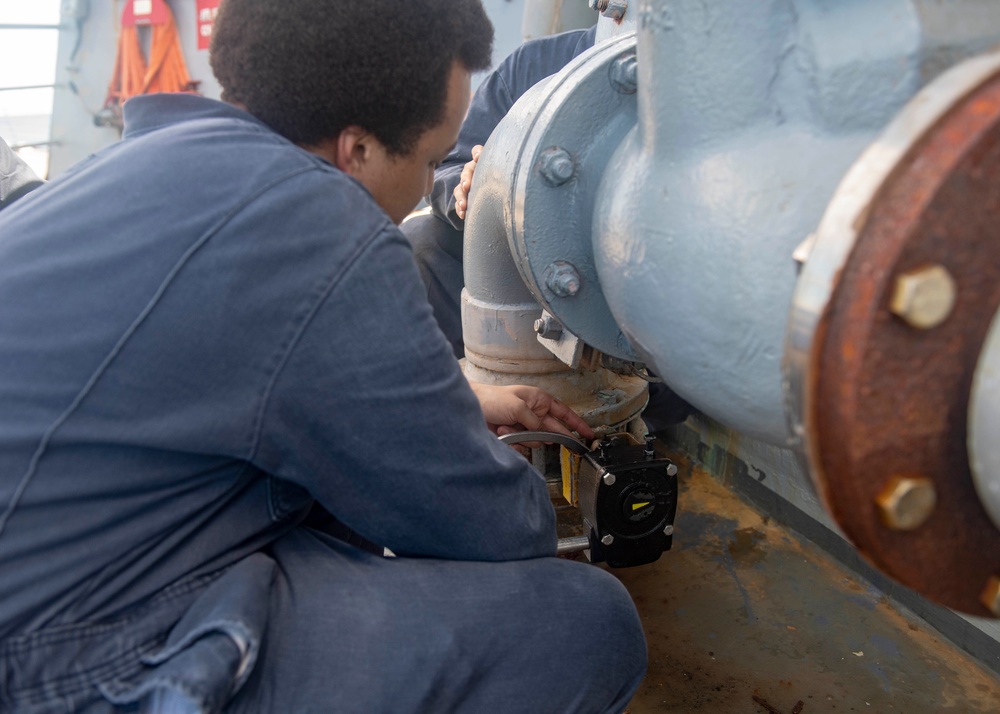 Sailors Conduct Maintenance Onboard USS Mustin